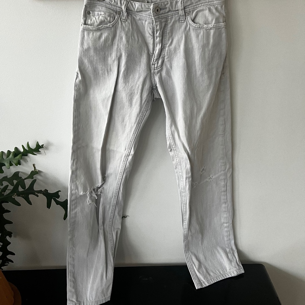 Slim straight distressed jean